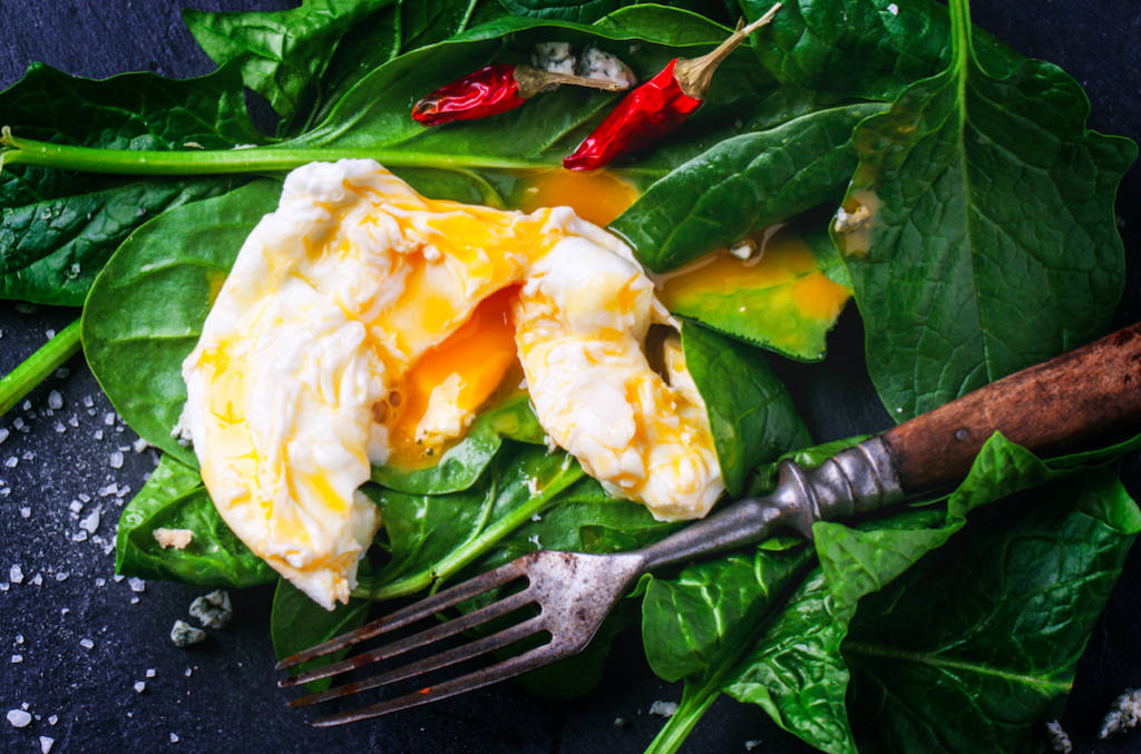 Poached Eggs over Four-Spice Spinach